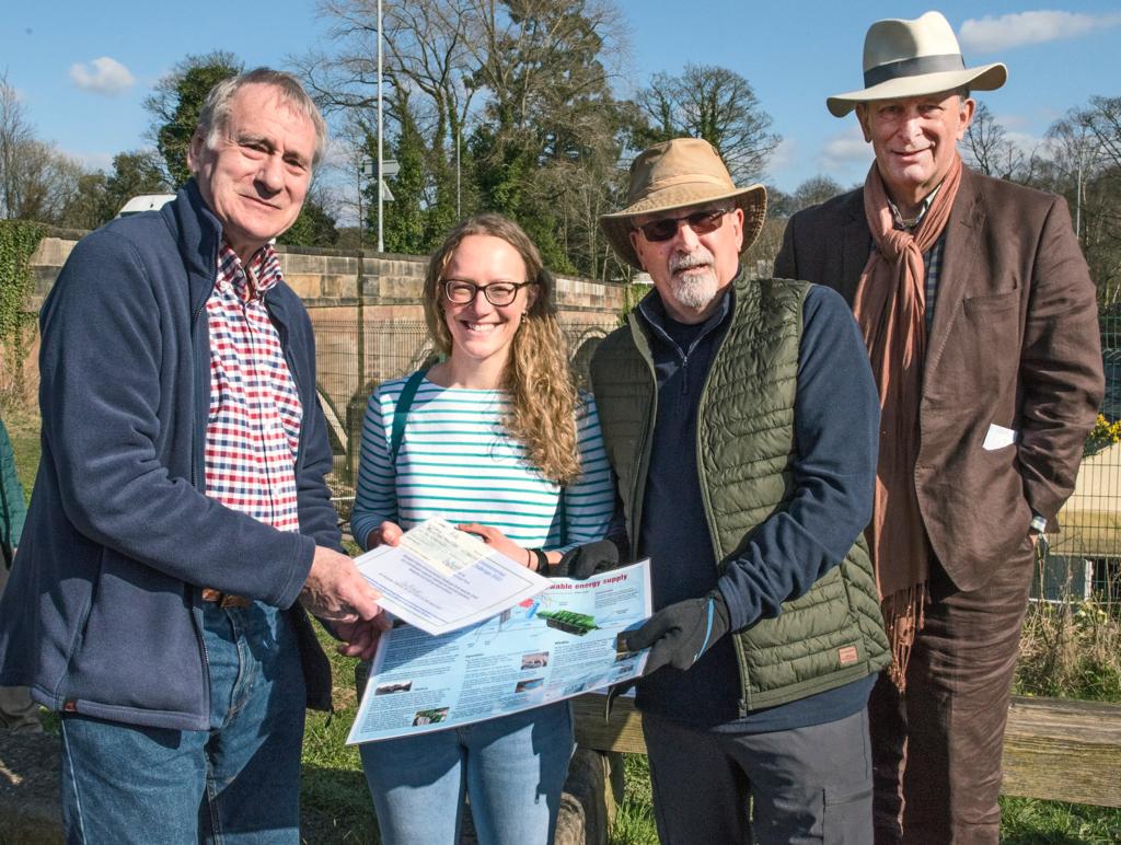 Sarah Braide and Mark Whittaker receive our Stockport Hydro Award from Laurence Jackson and Ben Alexander on 18 March 2022.