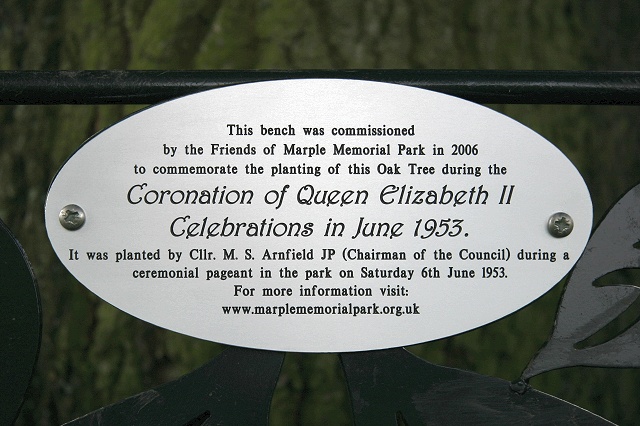 The new plaque explaining the bench